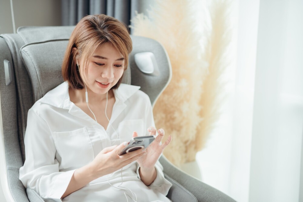 decfdb1f76a83e7c3bba7d6040e5b2dd Children playing basketball in a gym, with two players in red jerseys jumping to reach the ball and two others in purple jerseys actively participating. The YMCA logo is visible in the background, highlighting the community sports environment.